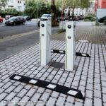 Tope de rueda para aparcamiento de vehículos eléctricos